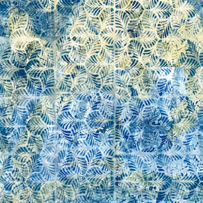 Patterned fabric with blue and green leaf design