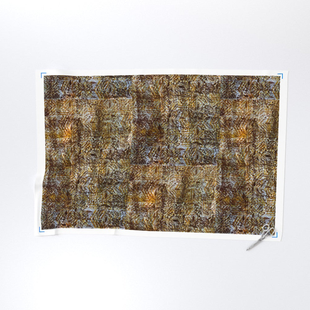 Textured brown and beige patterned fabric on a white background