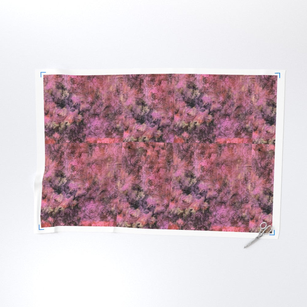 Textile with pink and purple abstract pattern on a white background