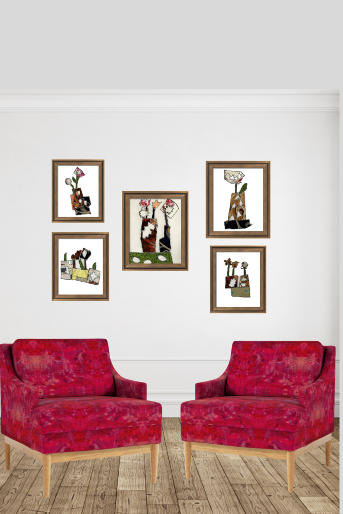 Two red armchairs in a room with framed artwork on the wall.