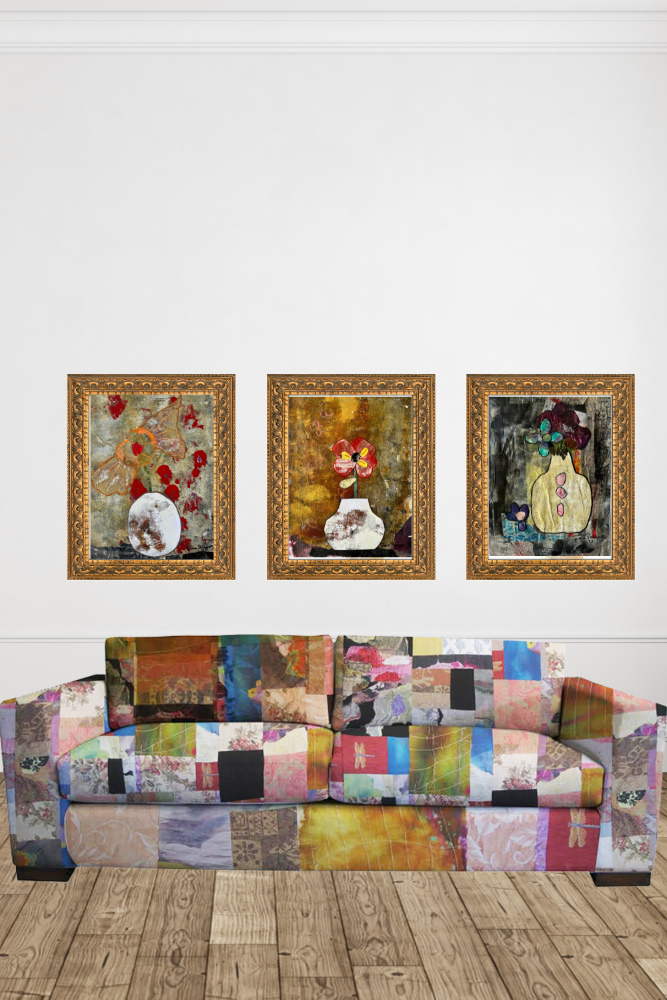 Colorful patchwork sofa with three framed artworks on a white wall.