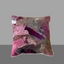 Multicolored patchwork pillow on a gray background