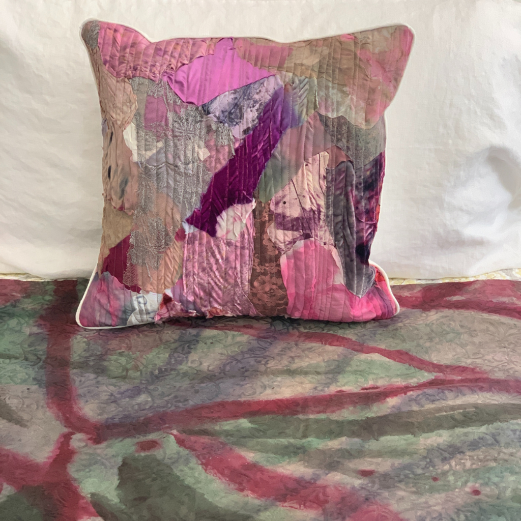 Multicolored pillow on a textured surface