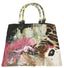 Art print of a handmade purse titled Jungle, designed by Sara Palacios using layered textiles, sequins, embroidery, and leopard print elements.