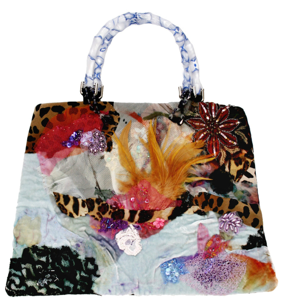 Art print of a handmade purse titled Sky, created by Sara Palacios with feathers, sequins, lace, and bold mixed-media textile elements.