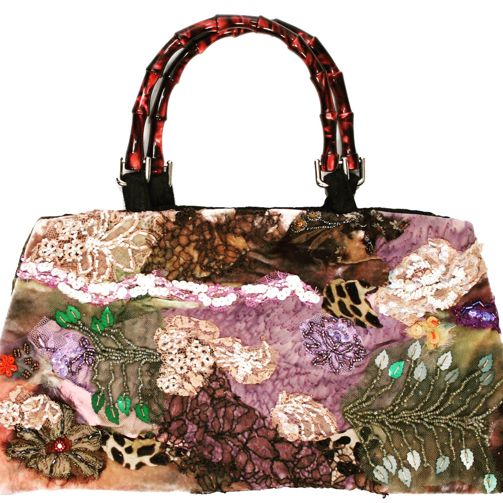 Art print of a handmade purse titled Hanging Gardens of Babylon, created by Sara Palacios with embroidered lace, sequins, and rich textile textures.