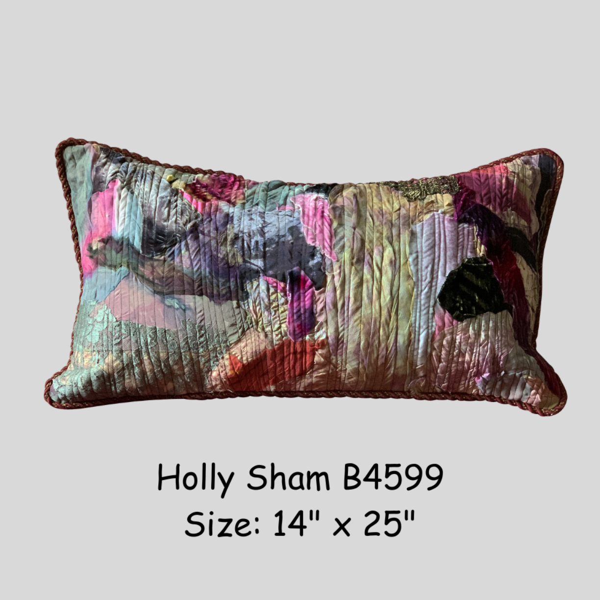 Multicolored pillow with floral pattern on a light gray background