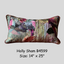 Multicolored pillow with floral pattern on a light gray background