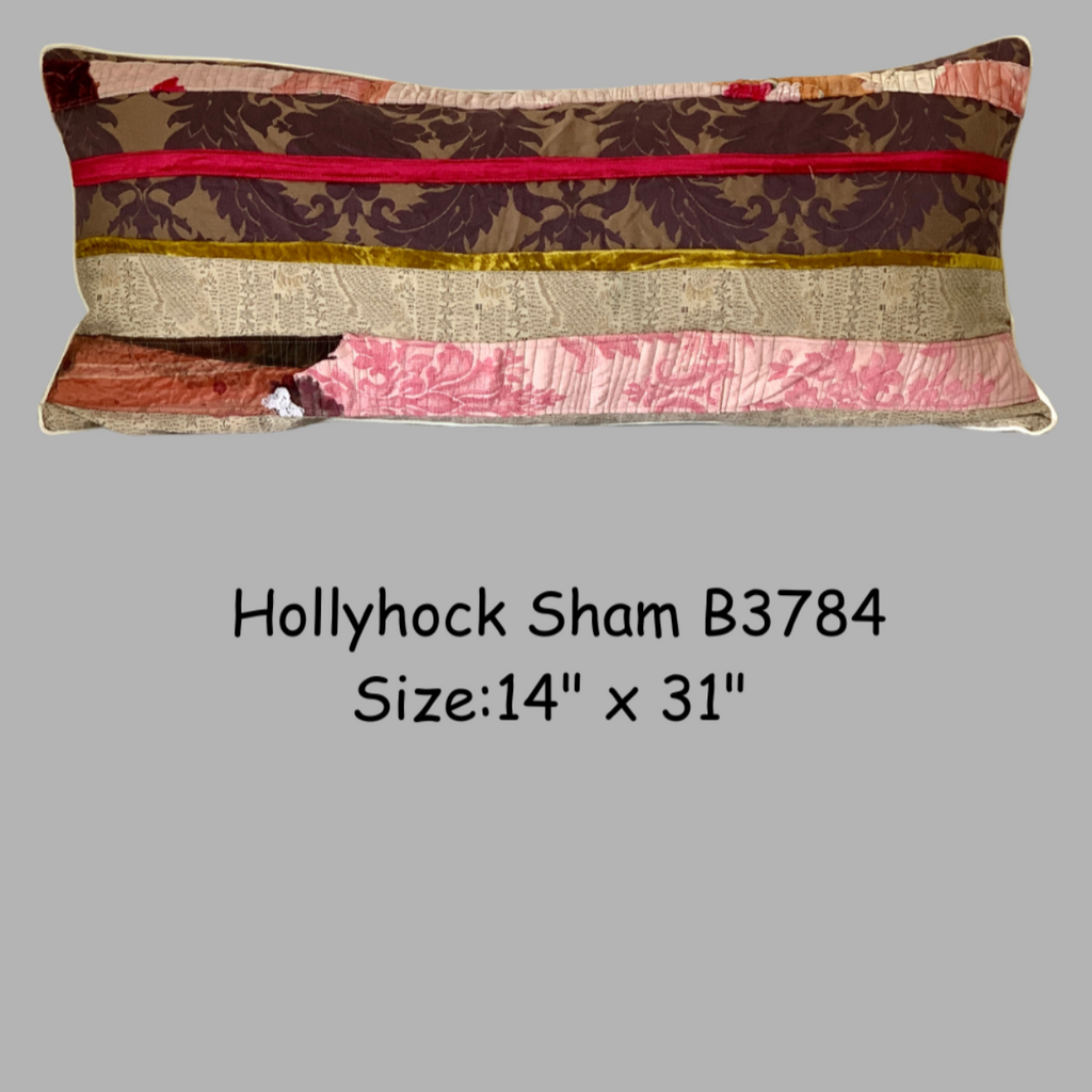 Decorative pillow with floral and solid patterns on a gray background