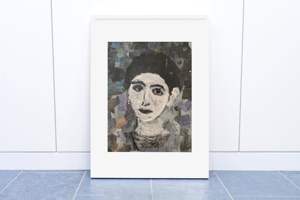 Handmade collage portrait of a woman with expressive eyes and a calm presence, created with textured hand-painted papers in deep blues and neutrals.