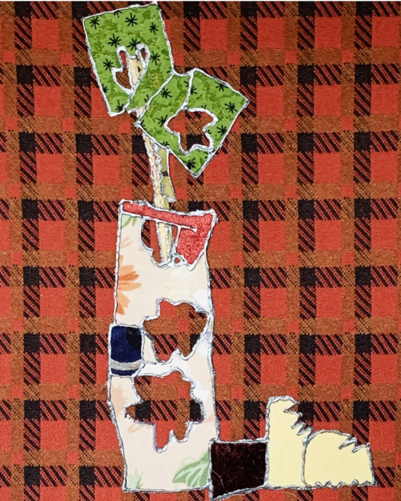 Colorful abstract design on a red and black plaid background