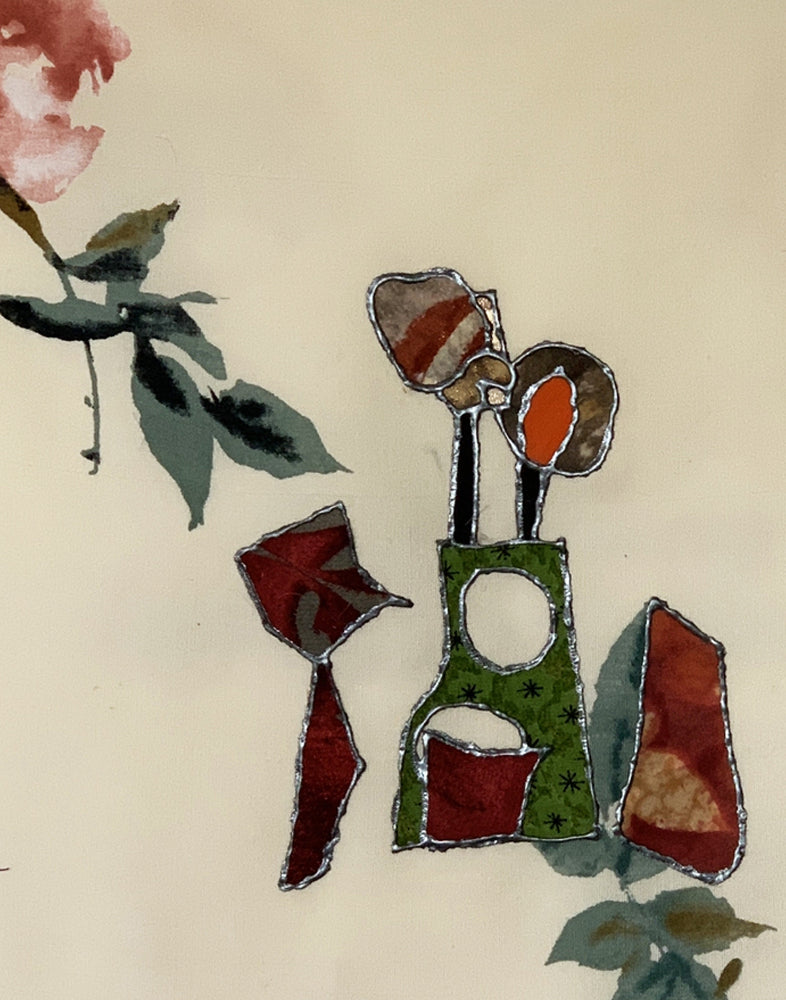 Decorative vase with floral elements on a beige background