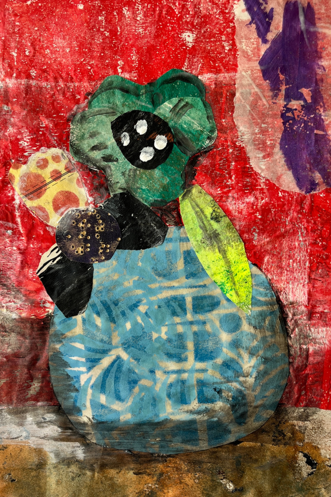 Collage art with a blue vase, green flower, and black dots on a textured red background