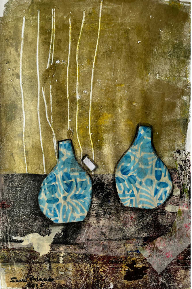Two blue ceramic vases on a textured brown and black background