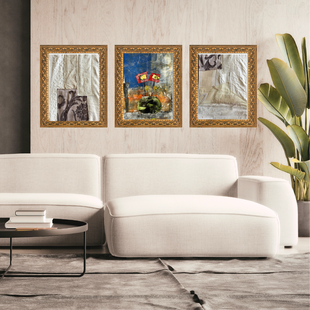 Wall Art. Living room with a white sofa, decorative mirrors, and a plant.