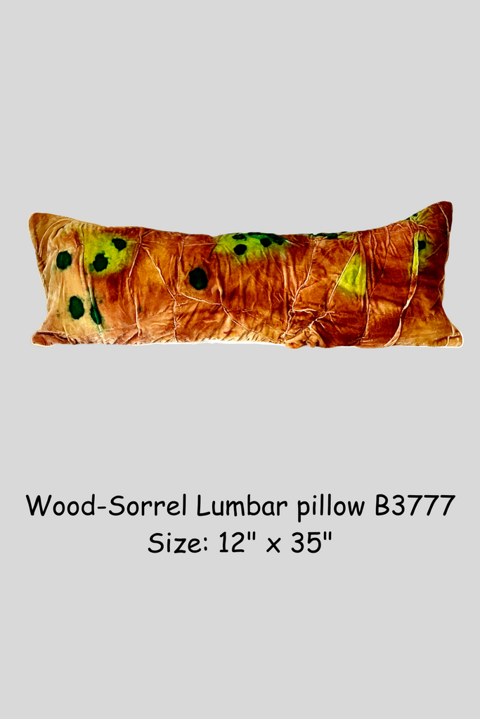 “One-of-a-kind Wood-Sorrel lumbar pillow in velvet with hand-painted green and gold accents by Sara Palacios Designs