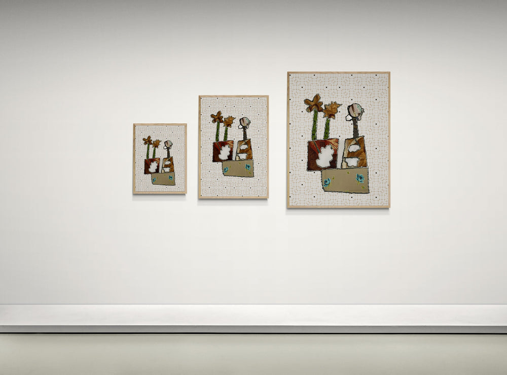Three framed artworks on a white wall