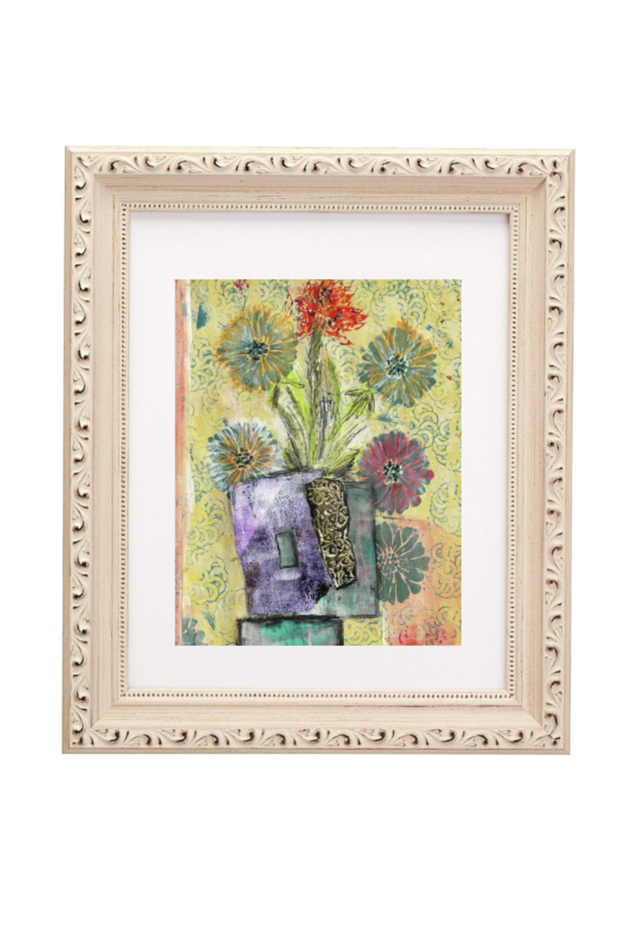 Framed artwork with colorful floral design on a white background