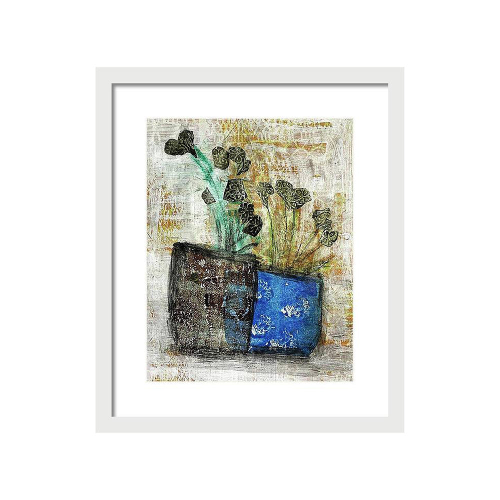 Mixed media collage titled Moon Tear by Sara Palacios. The artwork showcases dark leafy stems emerging from a two-toned vase—textured brown on one side, vibrant blue on the other—set against a softly layered cream and gold background with subtle patterns.