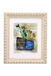 Framed abstract artwork with a blue pot and green plants on a white background