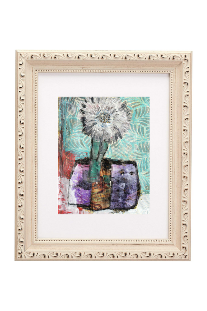 Framed abstract artwork with a decorative white frame on a white background