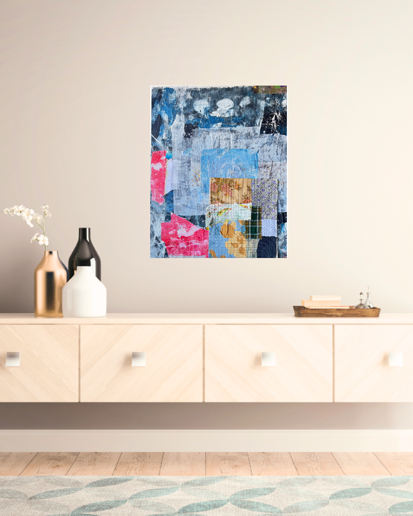 blue mixed media artwork ontop of a white cabinet