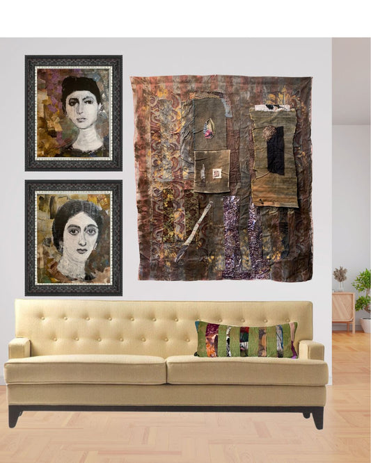 white sofa, with a green pillow, 2 women protrait hanging in the back wall with a brown wallhanging