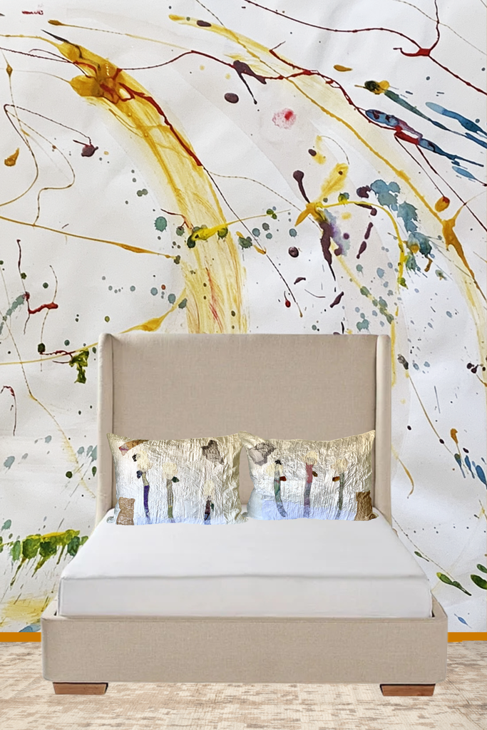 Handcrafted silk pillow set with floral appliqué design by artist Sara Palacios, featuring textured fabric and unique handmade details.