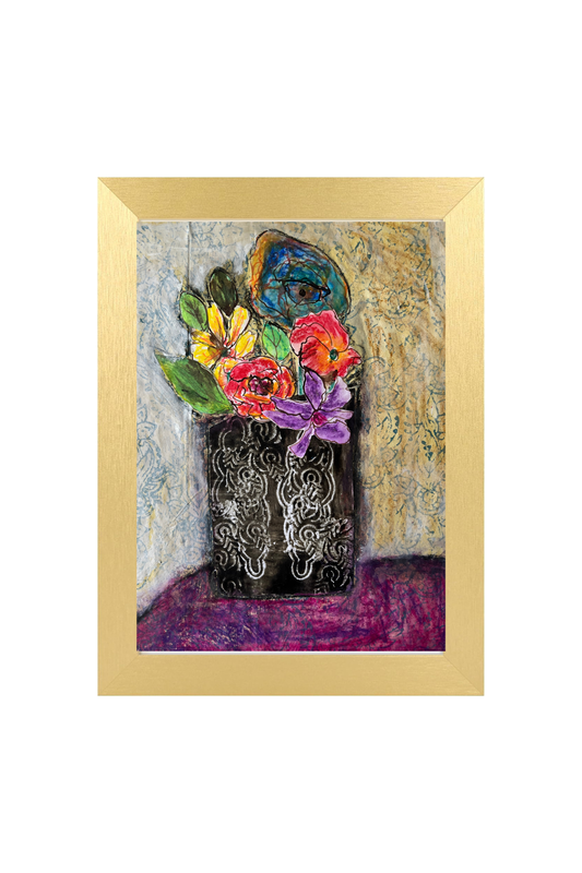 Framed artwork of a black vase with colorful flowers against a textured wall.
