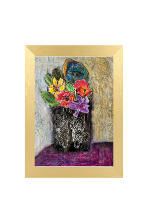 Framed artwork of a black vase with colorful flowers against a textured wall.