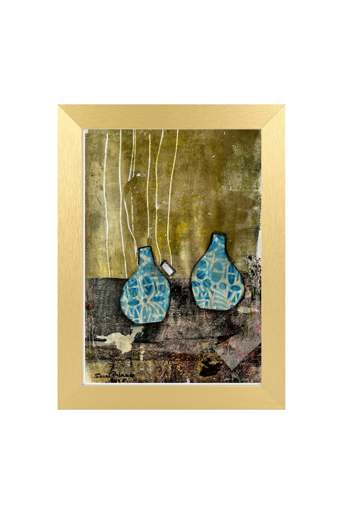Framed artwork with two blue ceramic vases on a textured background