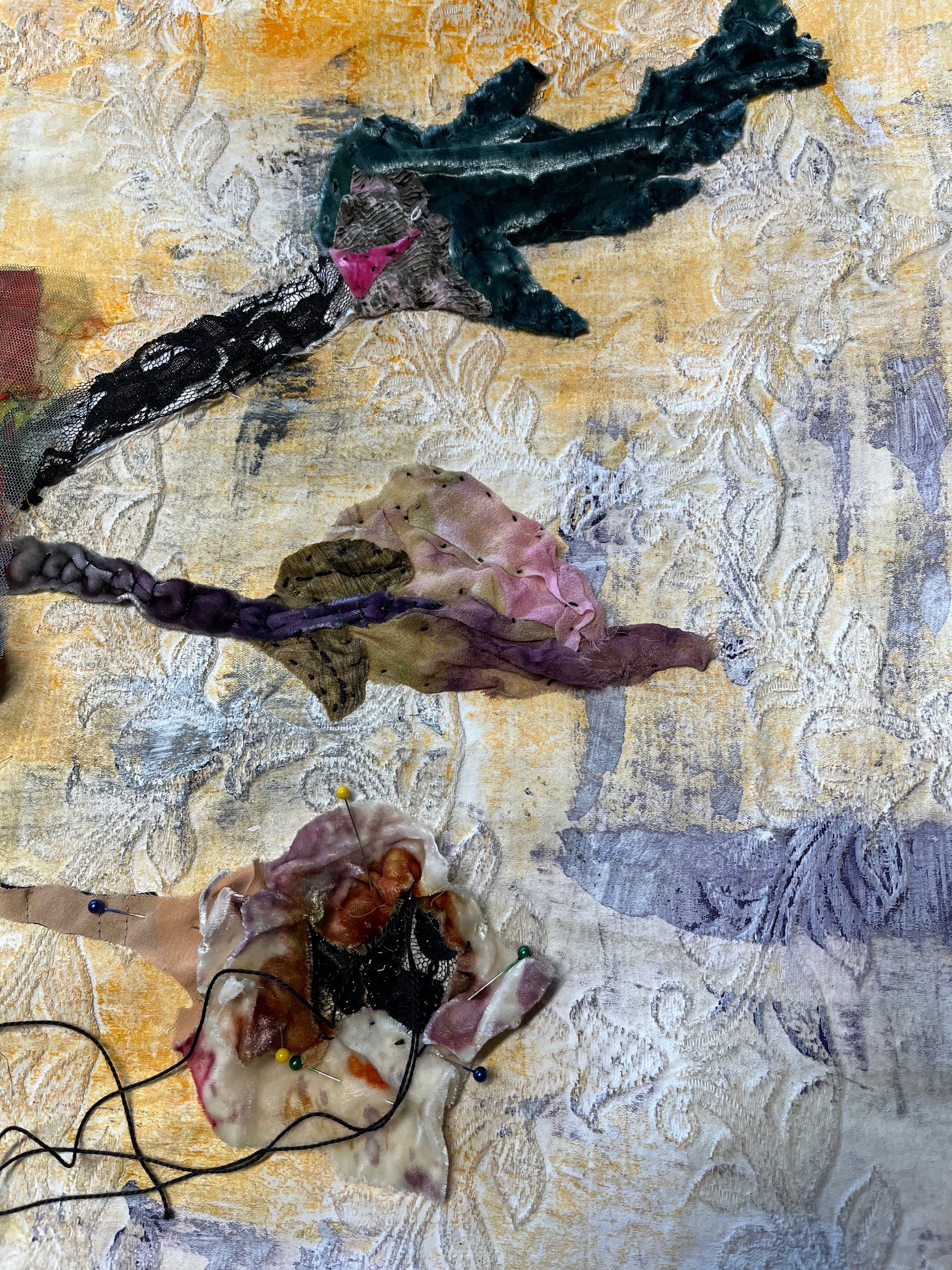 Abstract art piece with textured surface and various colors