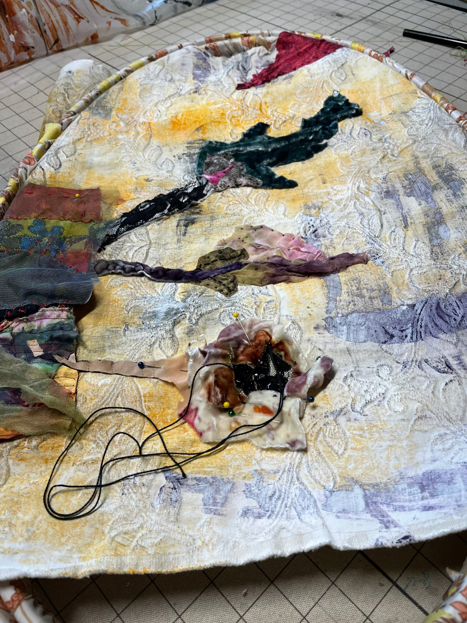 embroidery details, abstract flowers on a white, yellow background