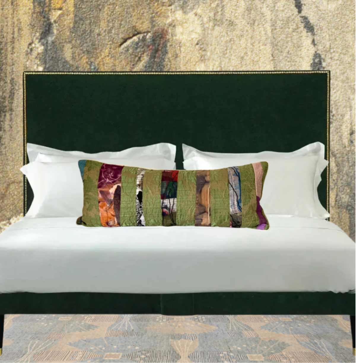 Bed with decorative pillows against a textured wall