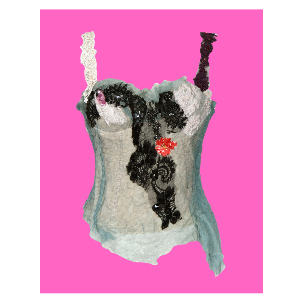Decorative top with black floral design on a pink background