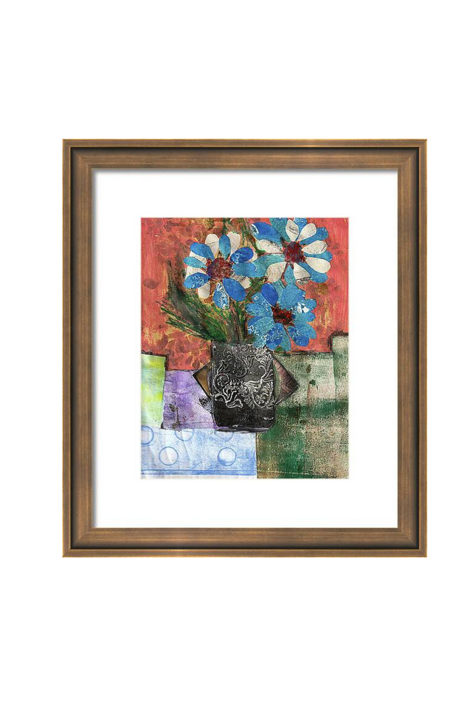 Framed artwork with colorful flowers and abstract design on a white background