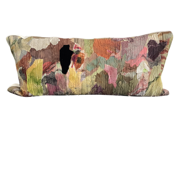 Decorative pillow with a multicolored floral pattern on a white background