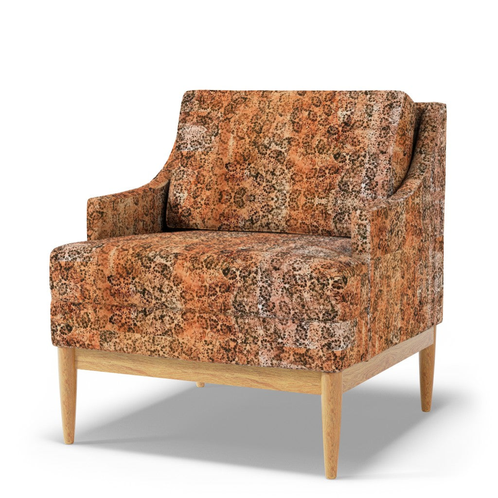 Patterned armchair with wooden legs on a white background