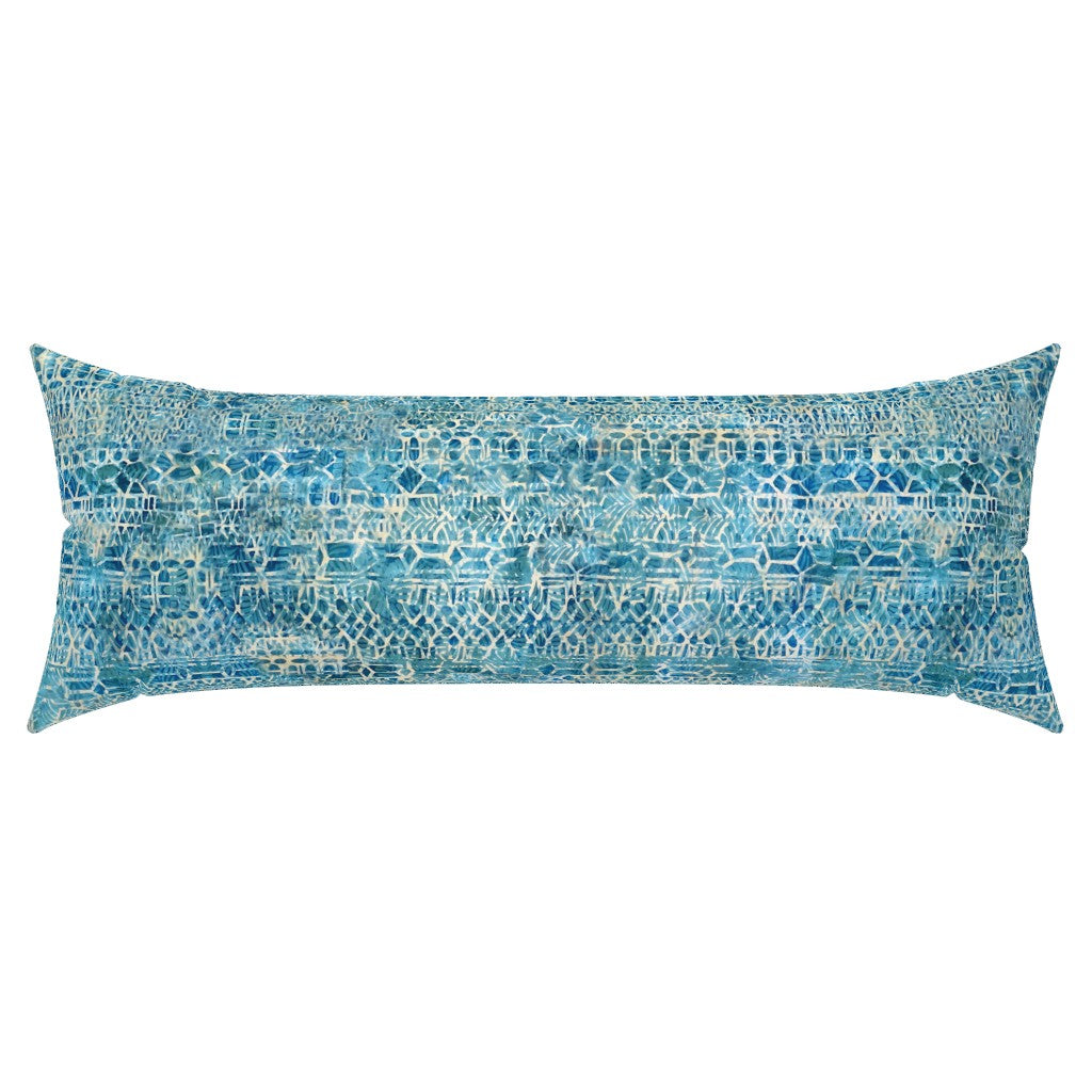 A rectangular lumbar throw pillow featuring a textured blue and white geometric pattern, shown against a plain white background.