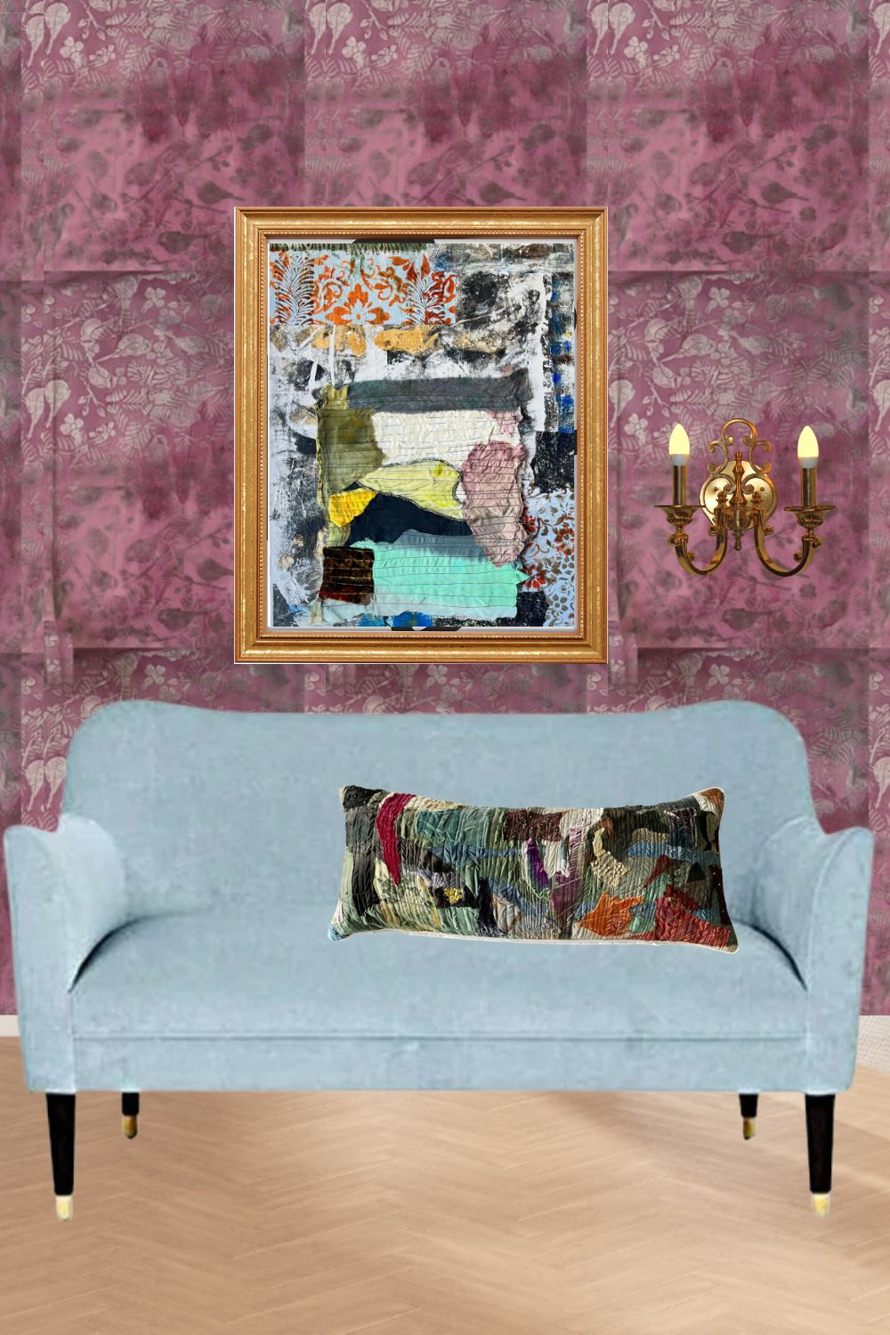 A framed abstract patchwork artwork hangs on a pink patterned wall above a light blue sofa with a matching patterned lumbar pillow. A gold wall sconce is visible on the right.