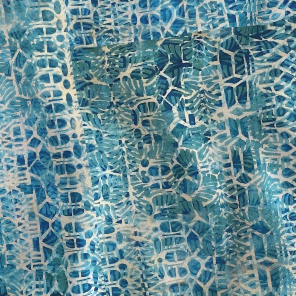 Textured fabric with blue and white pattern