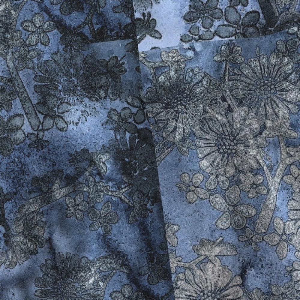 Floral patterned fabric with blue and gray tones