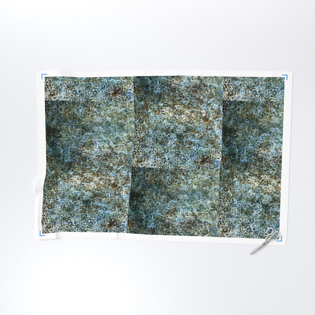 Textured green and brown pattern on a white background