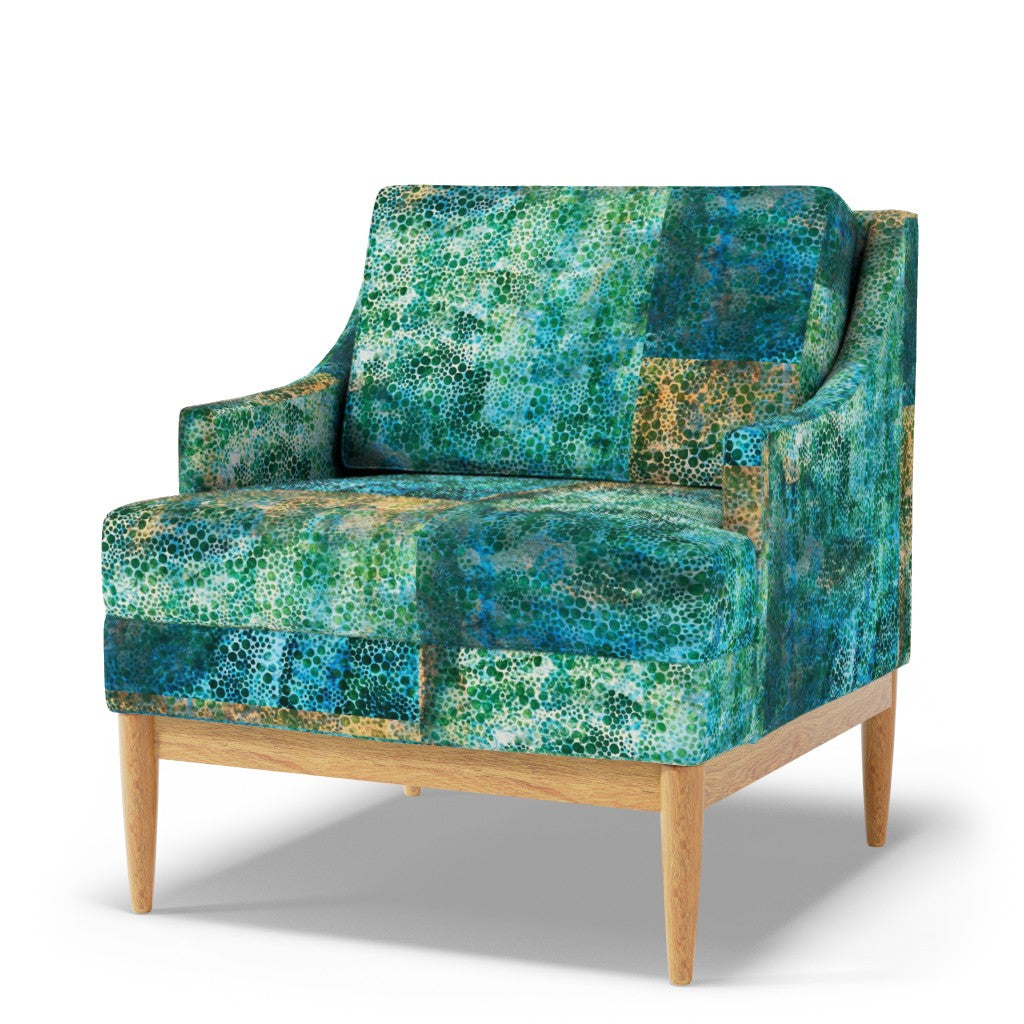 emeral green velvet chair in a white background
