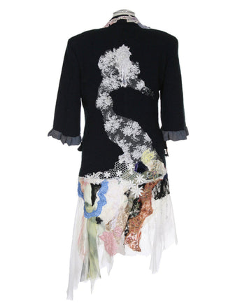 Flora Jacket is a stunning art print of a unique jacket by Sara Palacios, designed with lace appliqué, fabric collage, and handcrafted embellishments.
