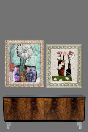 Two framed artworks on a gray wall above a wooden cabinet.