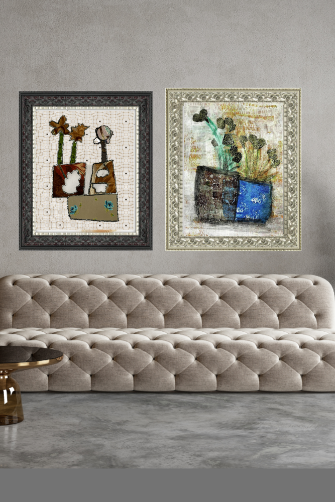 Two framed artworks on a gray wall above a beige sofa.