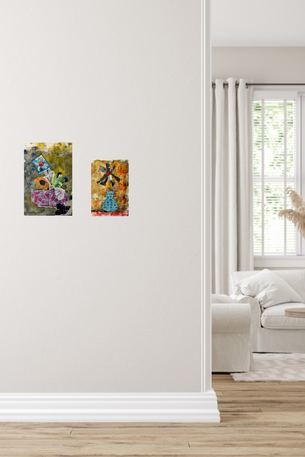 Two colorful abstract paintings on a white wall above a sofa.