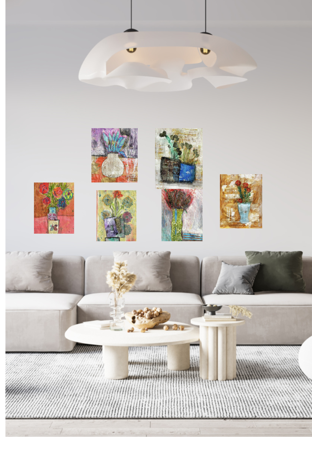 Living room with a gray sofa, colorful abstract paintings on the wall, and a white coffee table.