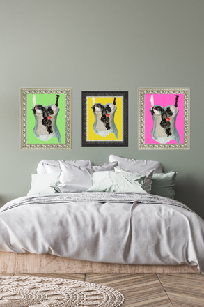 Three framed pictures of a dog on a wall above a bed.